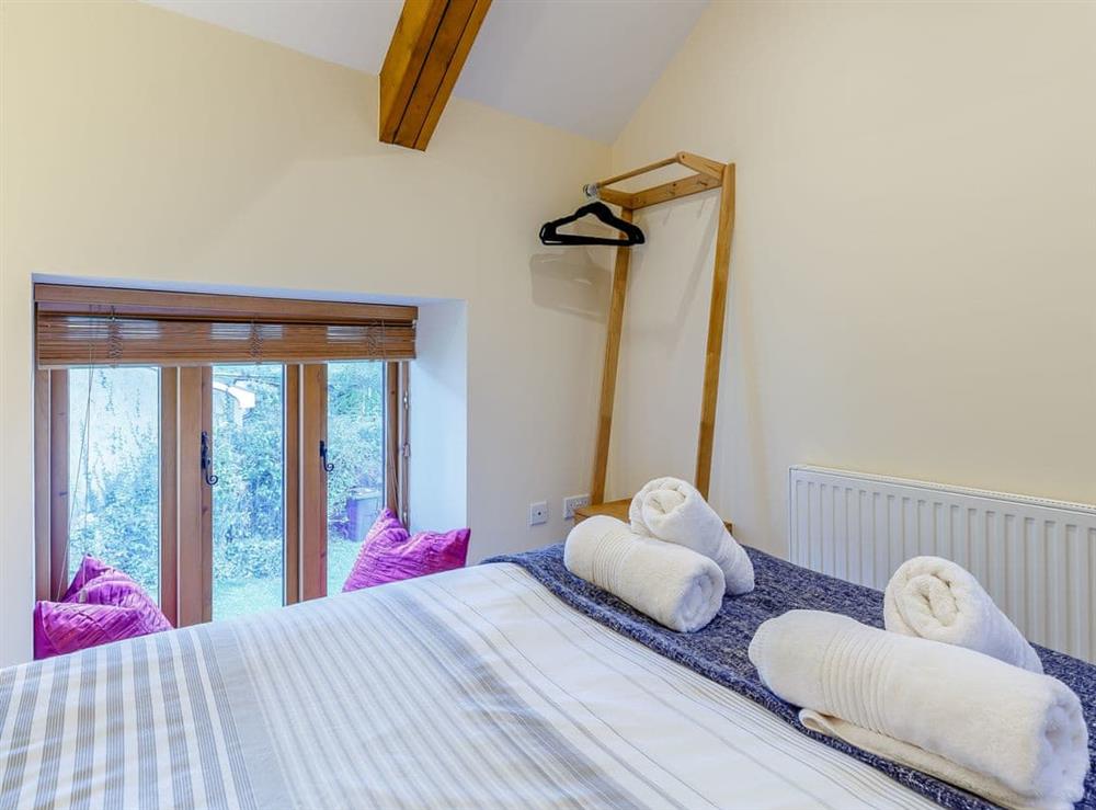 Double bedroom (photo 4) at Cherrycombe Barn in Luton, Devon