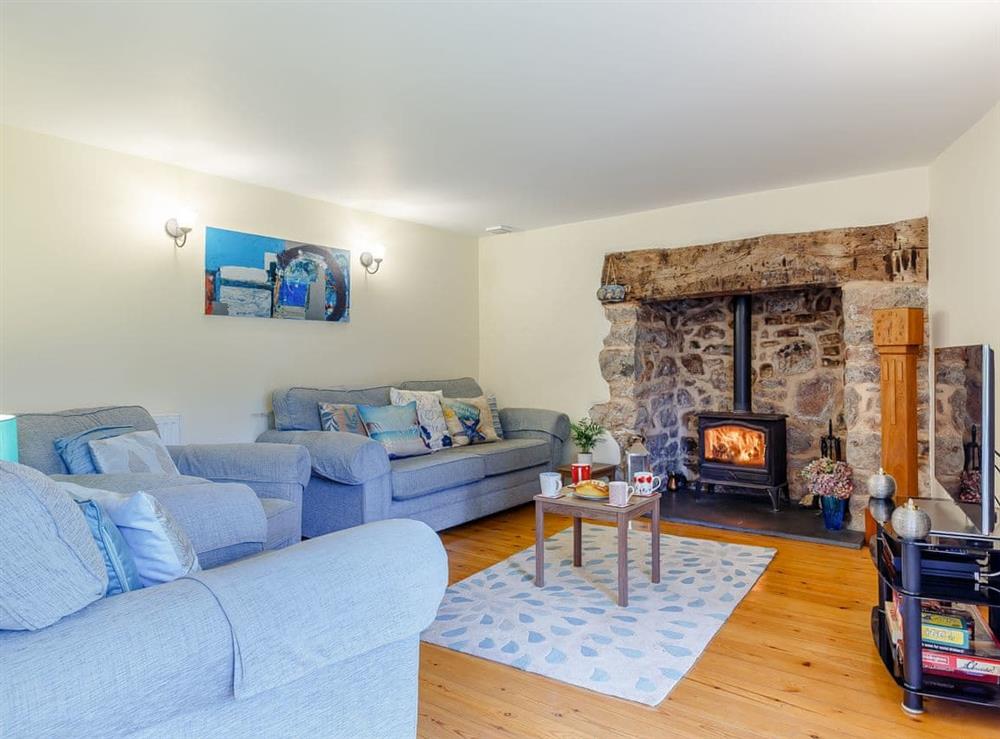 Living room at Cherrycombe Barn in Luton, Devon