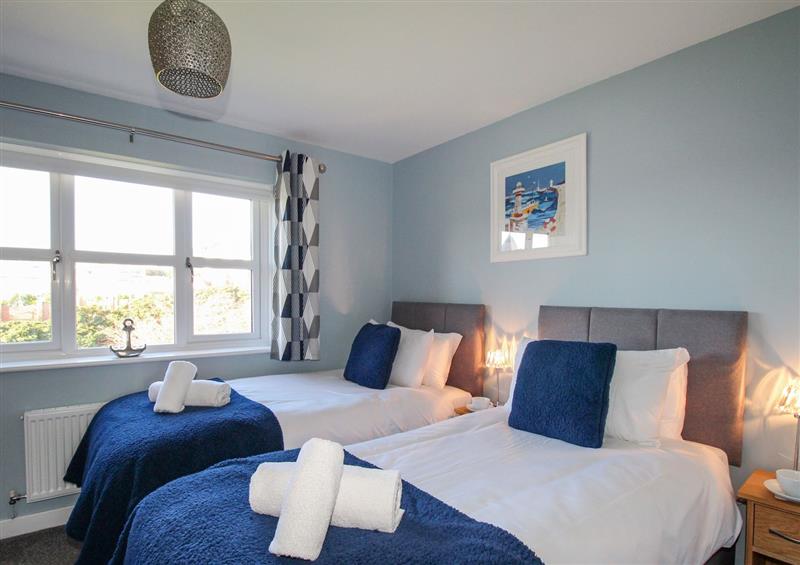 A bedroom in Chesil Retreat at Chesil Retreat, Weymouth