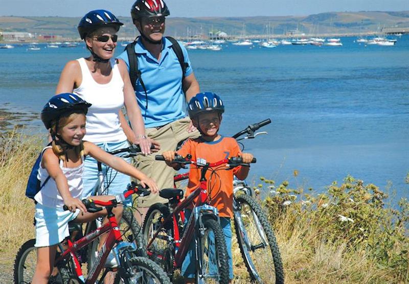 Cycling on the Rodwell Trail at Chesil Vista Holiday Park in Weymouth, Dorset