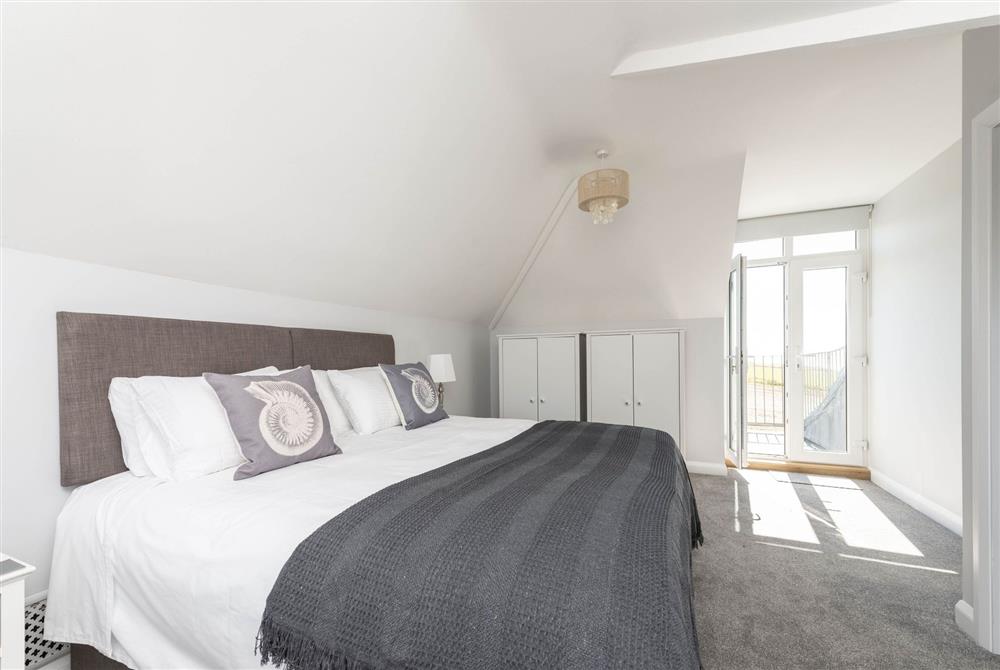 Twin or super-king size double bedroom with balcony at Chesil Watch, Abbotsbury