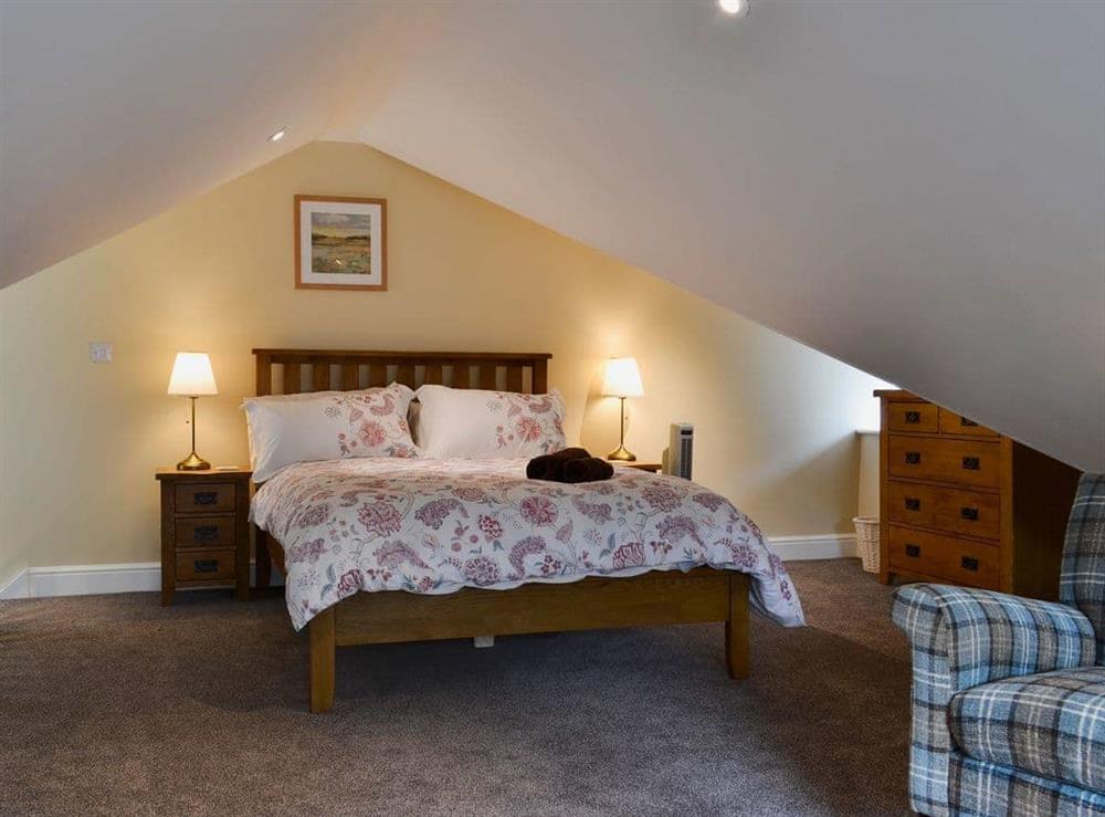 Spacious, galleried double bedroom at The Hayloft, 