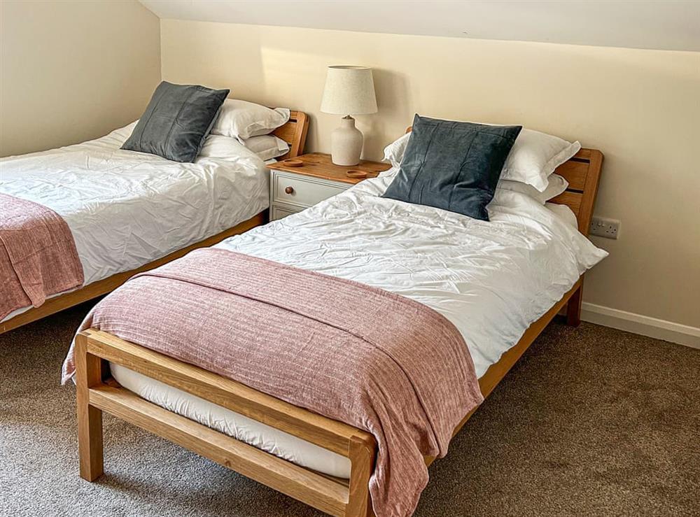 Twin bedroom at Chestnut Cottage in Coxley Wick, near Wells, Somerset