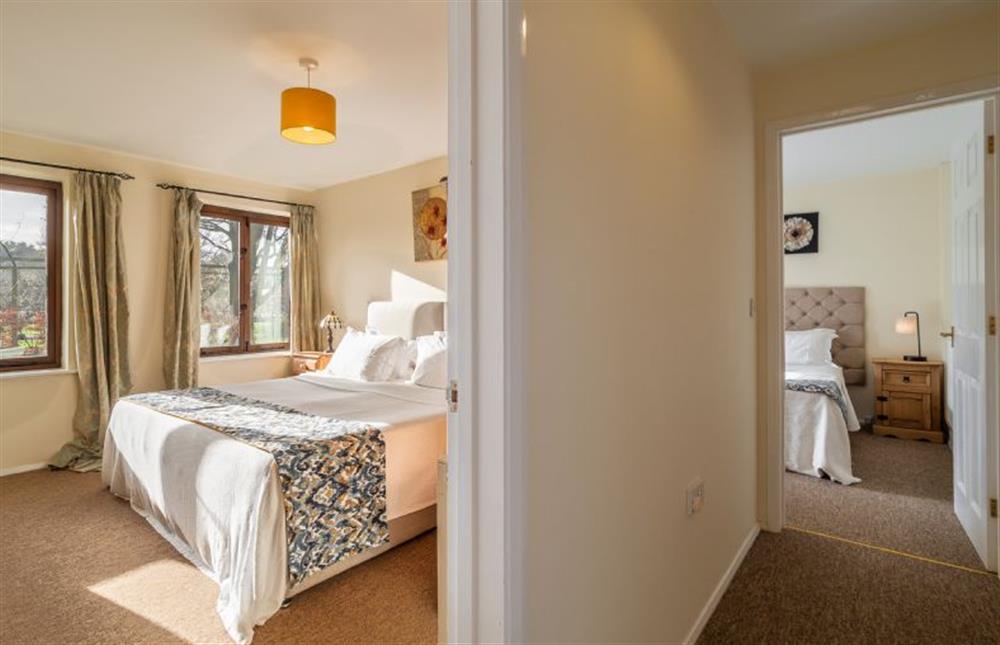 Views of the master bedroom and bedroom two at Chestnut Cottage, Westleton