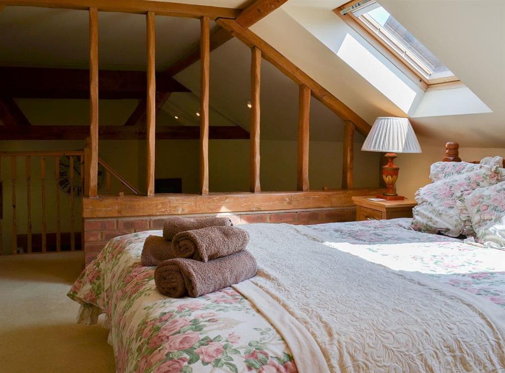 Lovely and cosy double bedroom with exposed woodwork at Binbrook House Mews, 