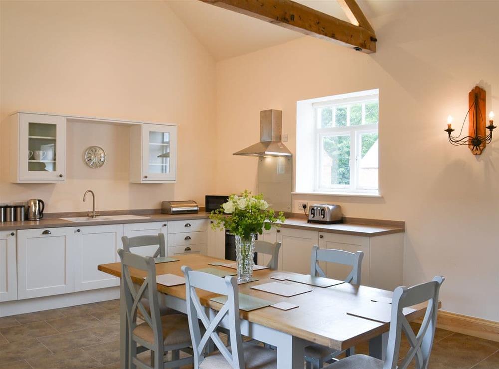 Spacious and well-presented kitchen/dining area at Chestnut Farm Mews, 