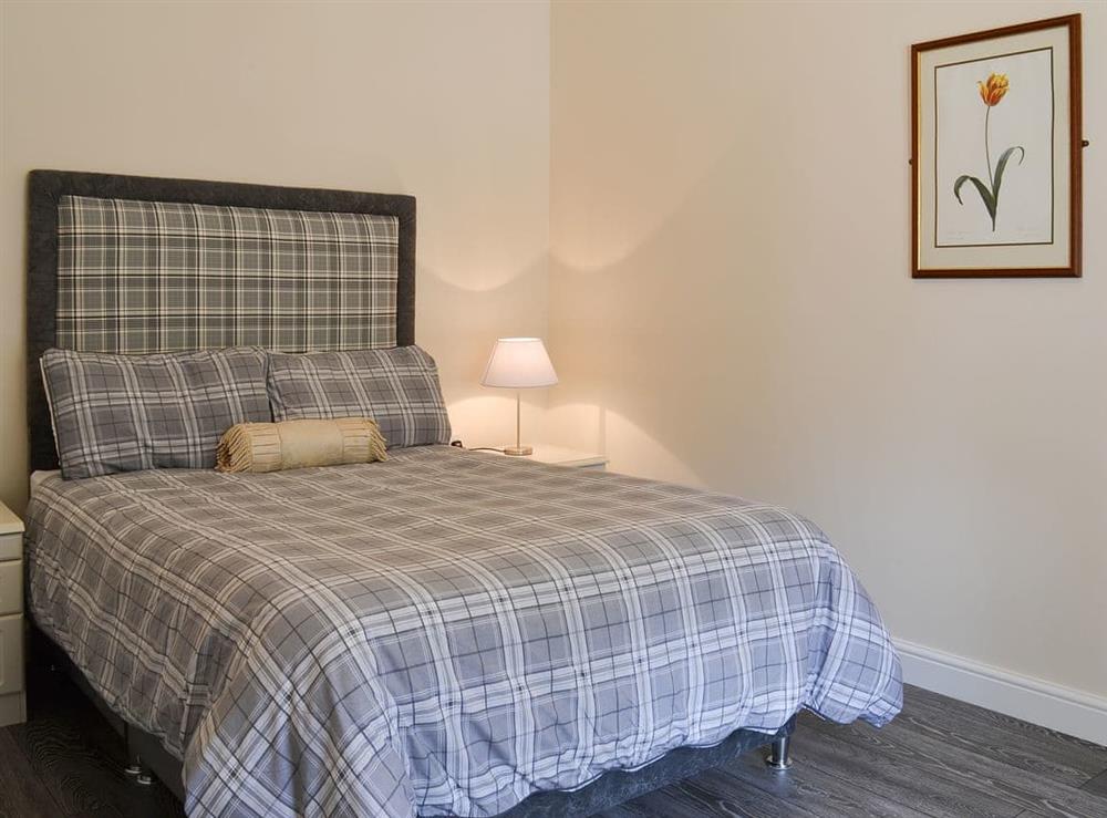 Warm and welcoming double bedroom at Granary Lodge, 