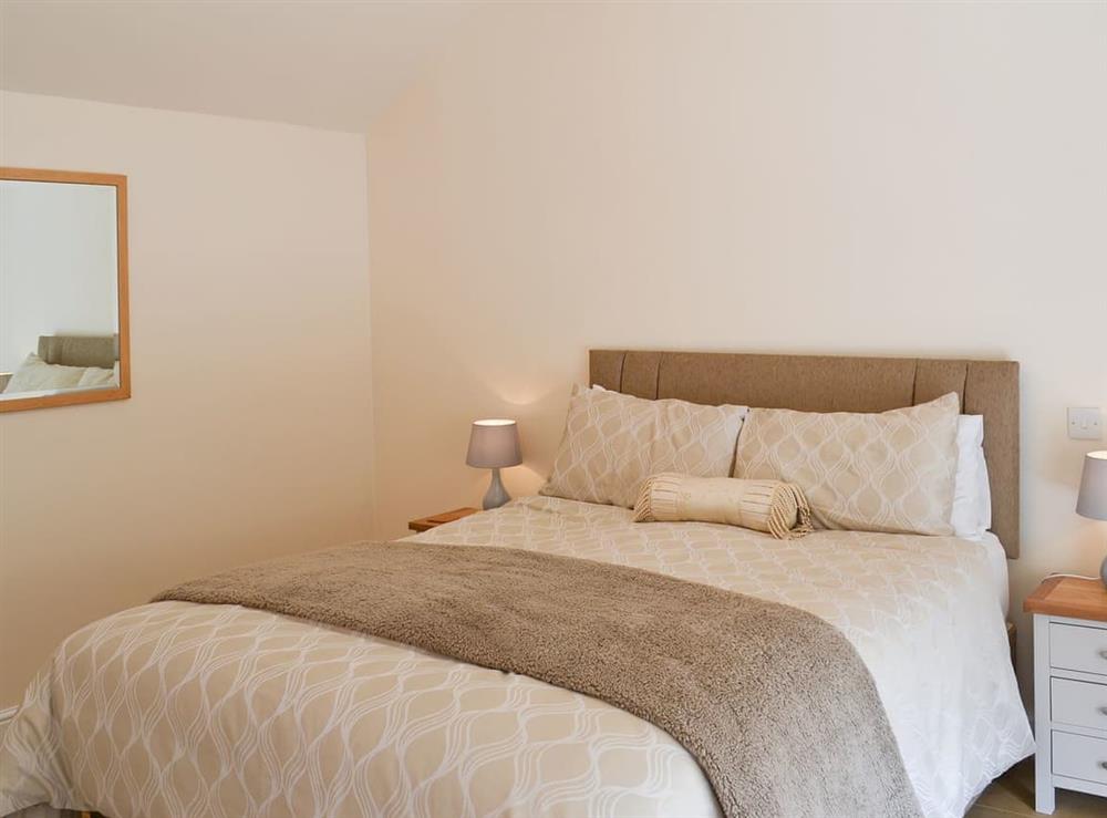 Warm and welcoming double bedroom at Mays Mews, 