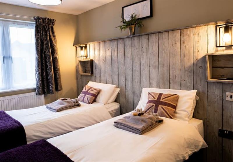 Twin bedroom in the York Deluxe Lodge at Chestnut Meadow in Ninfield, East Sussex
