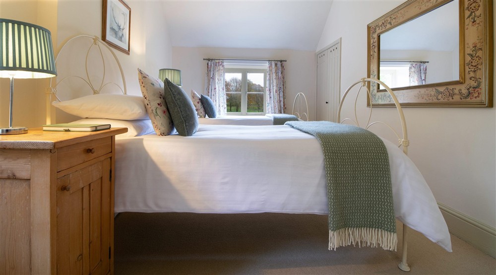 The twin bedroom at Chirk Home Farm Cottage in Chirk, Wrexham