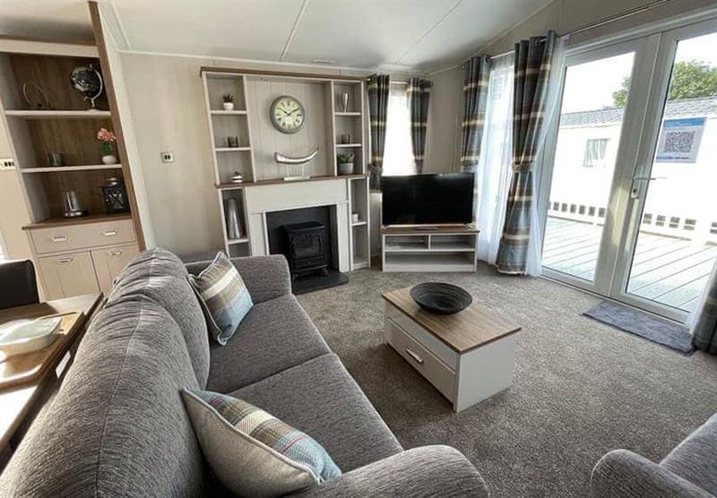 Living area in the Perranporth VIP 2 at Chiverton Holiday Park in Blackwater, St Agnes