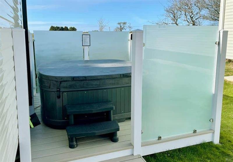 Outside hot tub in the Chapel Porth 3 at Chiverton Holiday Park in Blackwater, St Agnes