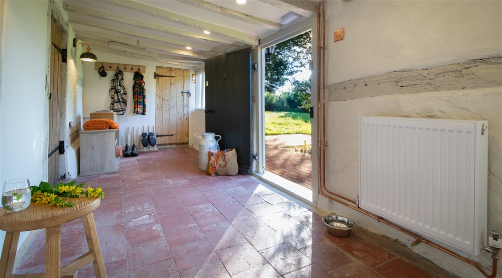 The boot room at Chodds Farmhouse in Haywards Heath, West Sussex