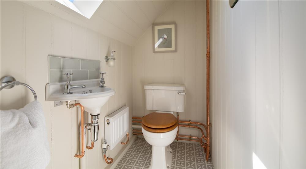 The WC on the first floor at Chodds Farmhouse in Haywards Heath, West Sussex