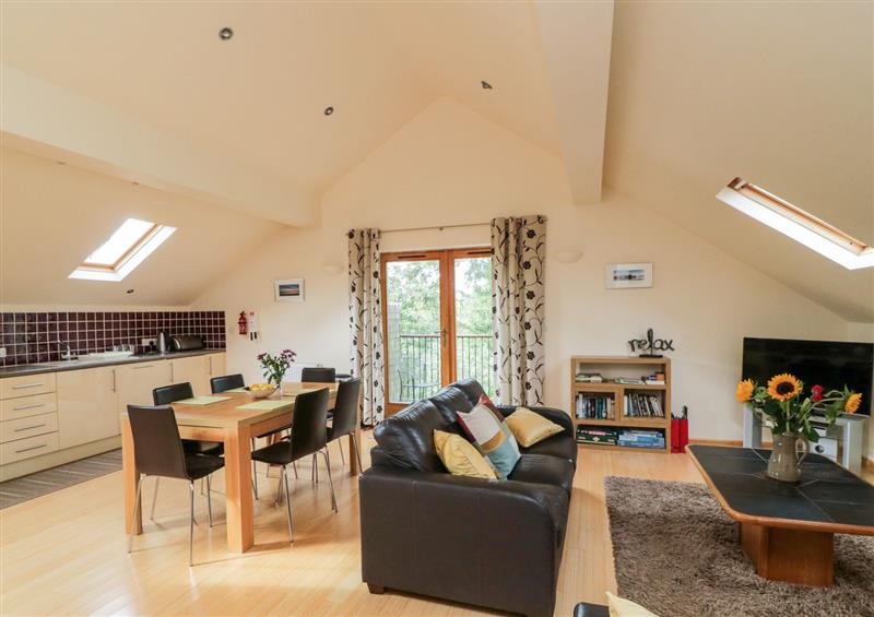 Relax in the living area at Cholwell Barn Apartment, Mary Tavy