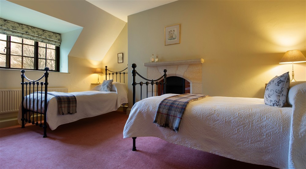 The first bedroom with twin beds on the first floor of Choristers House, Yorkshire at Choristers' House in Nr Ripon, North Yorkshire