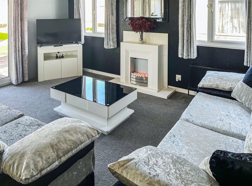 Open plan living space at Christeena Lodge in Corton, Suffolk