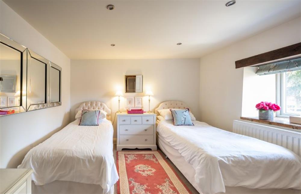 Bedroom two with twin beds at Christmas Barn, Snettisham near Kings Lynn