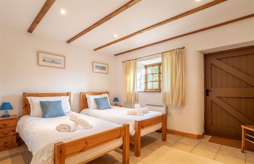 : Bedroom three with twin single beds at Church Close Cottage, Cusgarne, Truro 