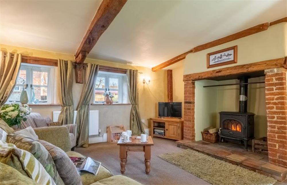 Ground floor: A dual aspect bright and sunny sitting room at Church Cottage, Castle Acre near Kings Lynn