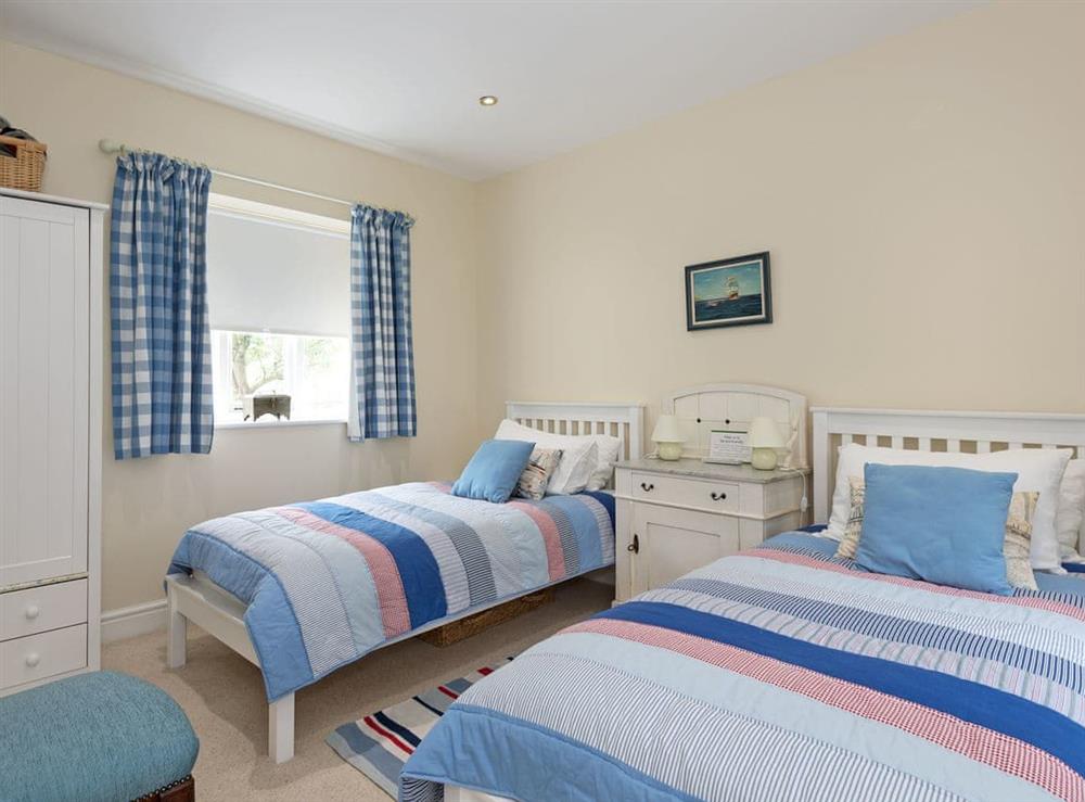 Charming twin bedroom at Church Cottage in Denford, near Thrapston, Northamptonshire