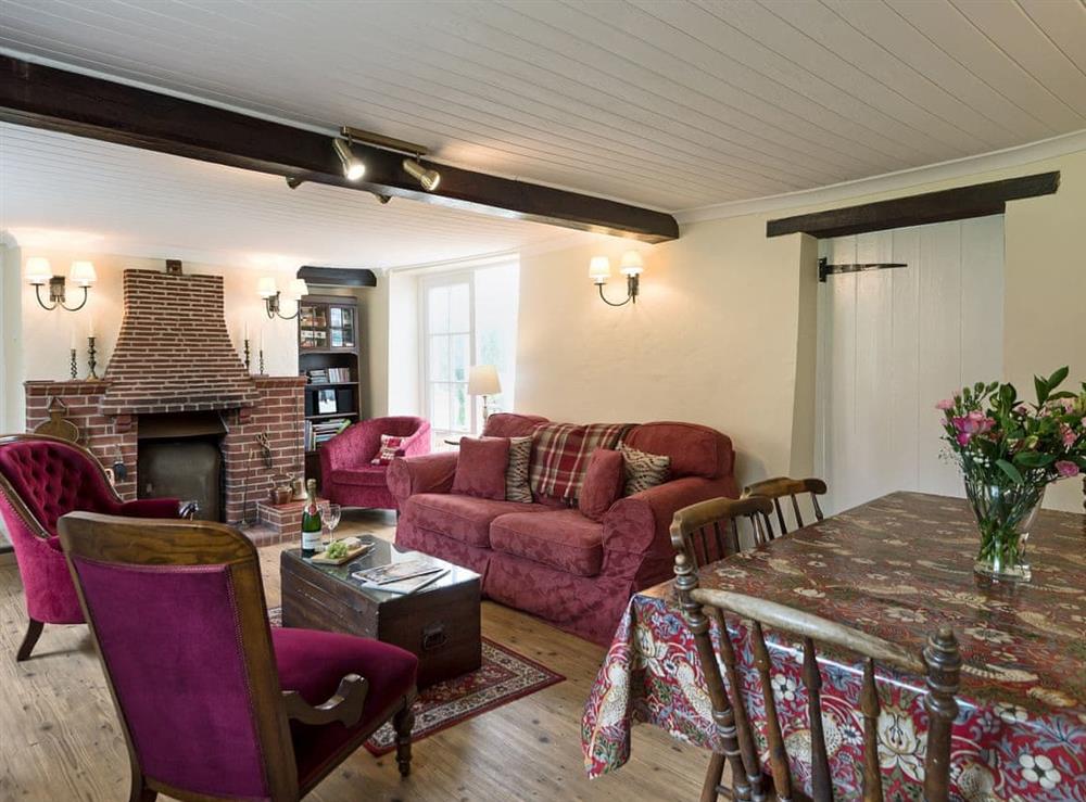 Charmingly furnished living/dining room at Church Cottage in Denford, near Thrapston, Northamptonshire
