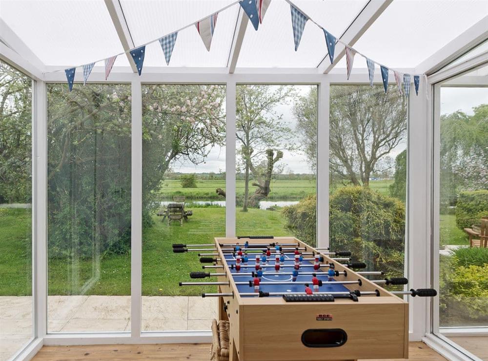 Fun games room at Church Cottage in Denford, near Thrapston, Northamptonshire