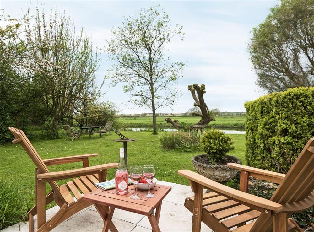 Relaxing sitting-out-area with wonderful views at Church Cottage in Denford, near Thrapston, Northamptonshire