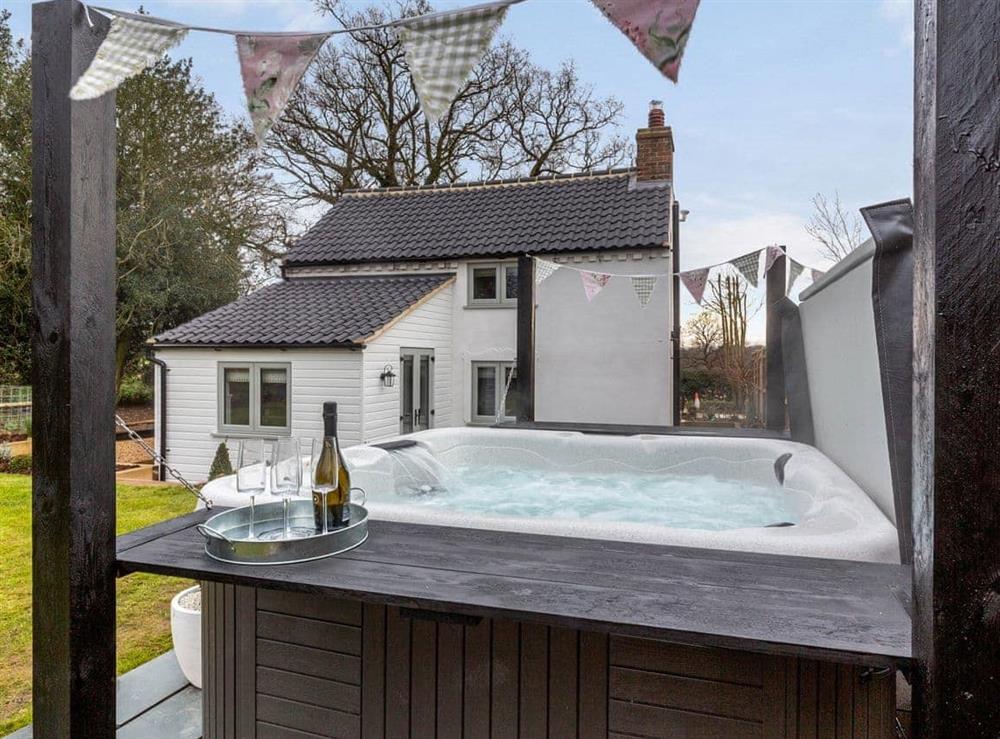 Hot tub at Church Cottage in Norton Subcourse, near Norwich, Norfolk