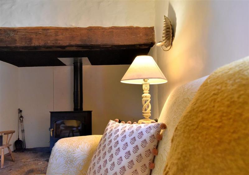 Relax in the living area at Church Cottage, Whitchurch Canonicorum