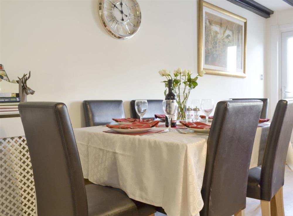 Stylish dining area at Church Court Cottage in Beeford, near Driffield, North Humberside