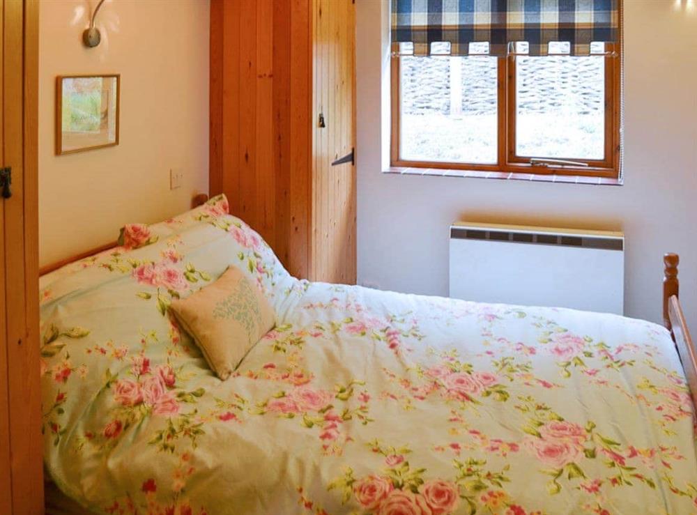 Comfortable and romantic double bedroom at Church Farm Studio in Surlingham, Norfolk