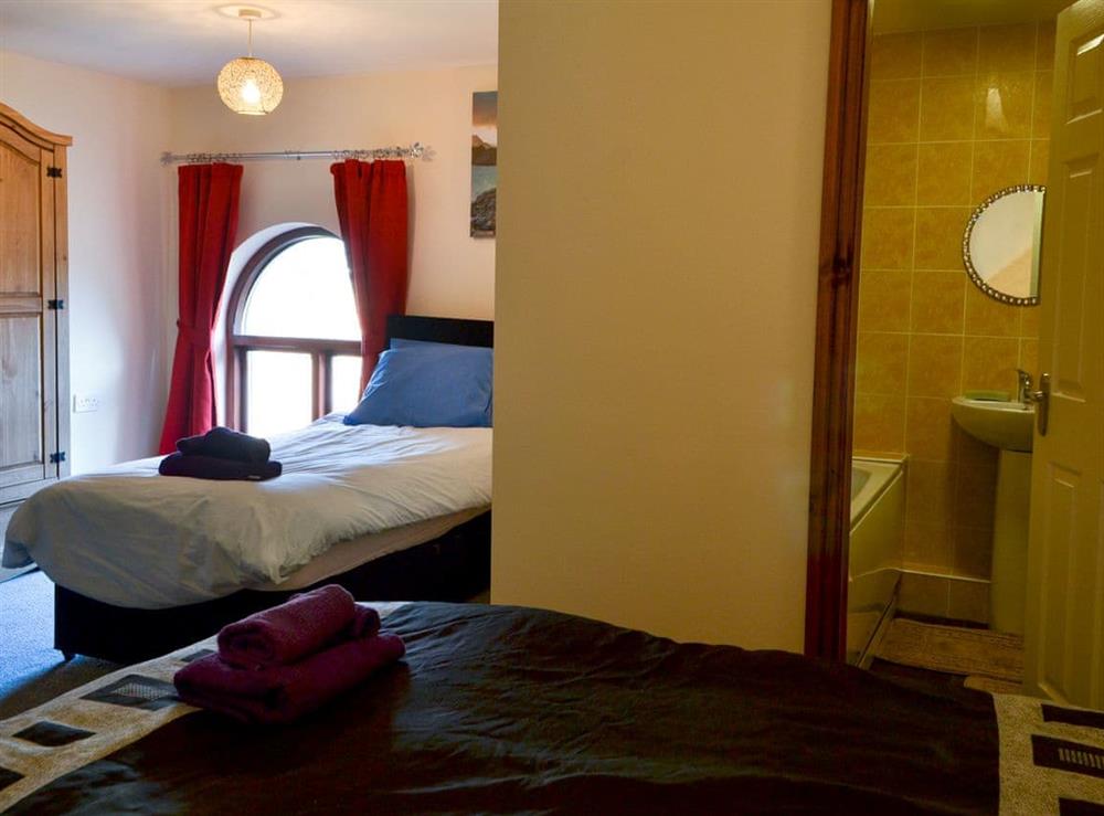 Relaxing bedroom with kingsize bed and additional single (photo 2) at Castle View, 