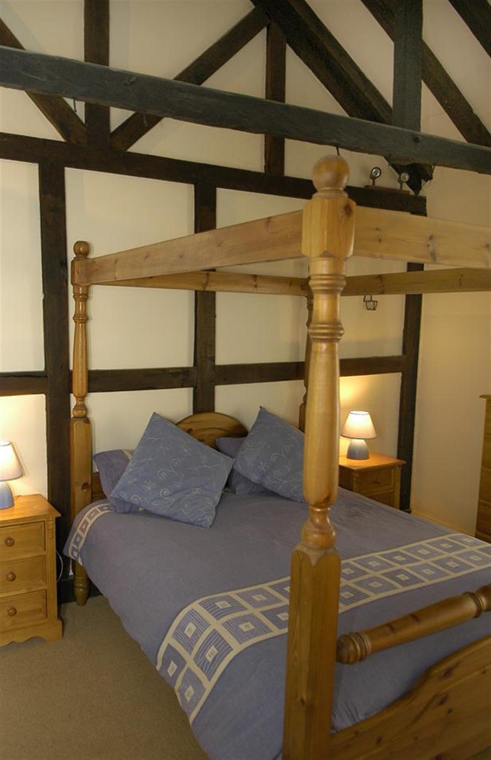 The four poster in the master bedroom  at Church House, Looe