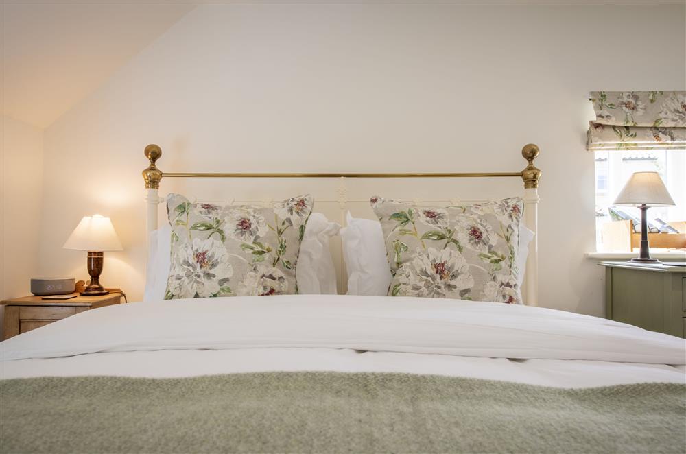 Bedroom one with a 6’ super-king size bed at Church View, Nunnington