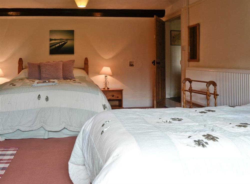 Twin bedroom (photo 2) at Churchtown Farm Cottage in West Anstey, Devon