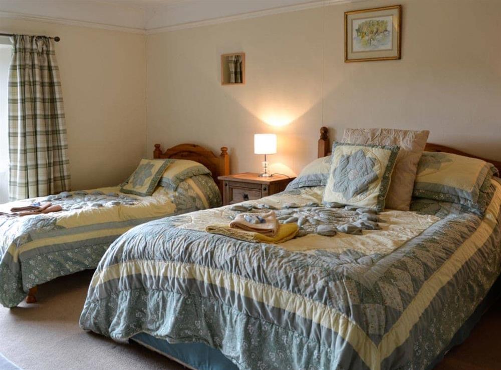 Twin bedroom (photo 3) at Churchtown Farm Cottage in West Anstey, Devon