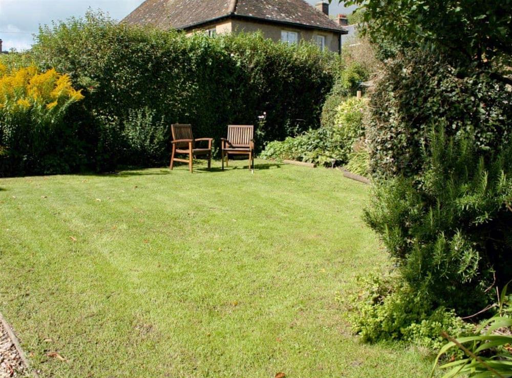Charming lawned garden at Churchview House in Winterbourne Abbas, near Dorchester, Dorset