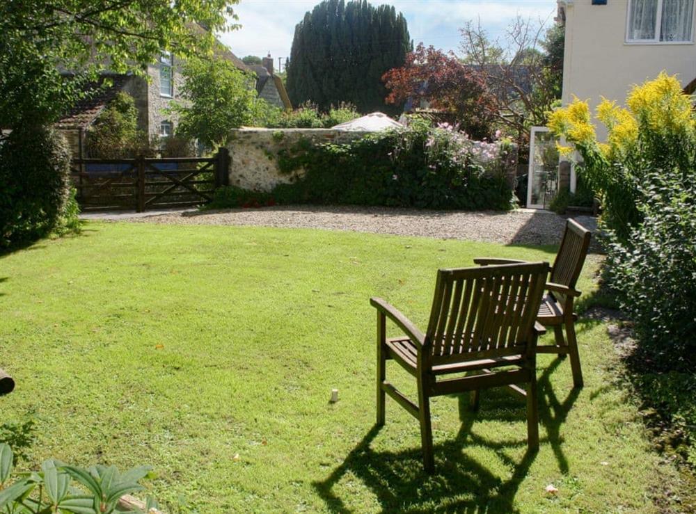 Delightful lawned garden at Churchview House in Winterbourne Abbas, near Dorchester, Dorset
