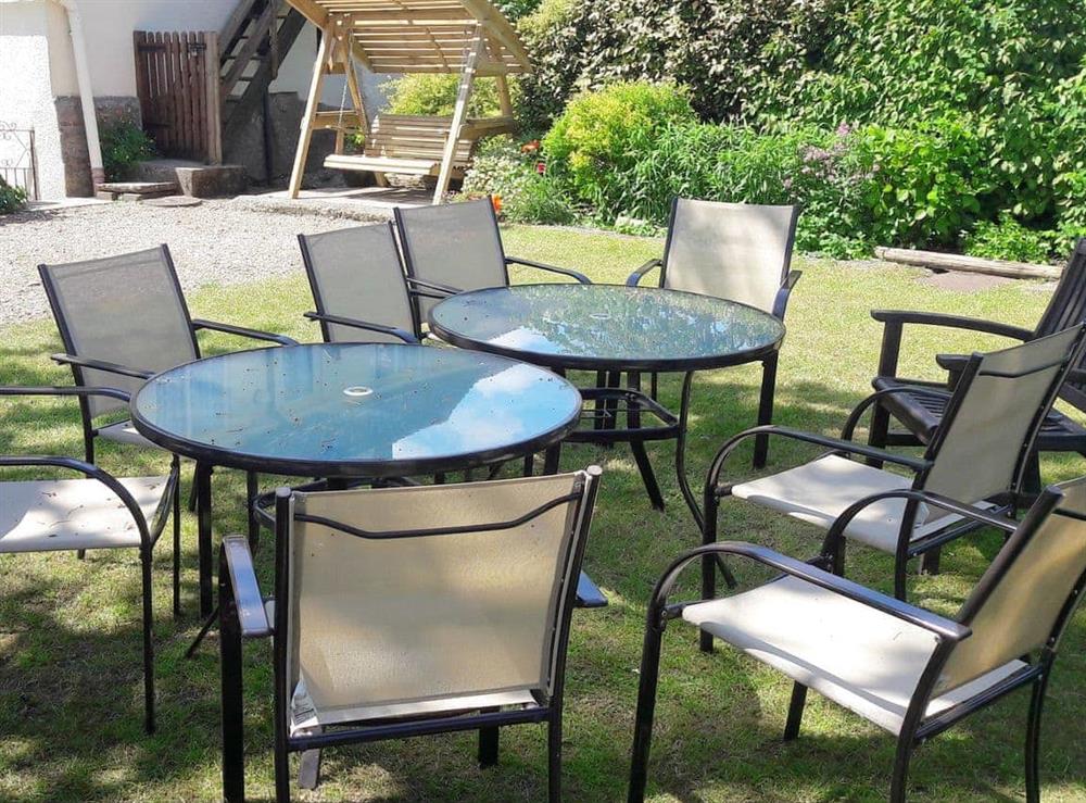 Garden area with outdoor furniture at Churchview House in Winterbourne Abbas, near Dorchester, Dorset