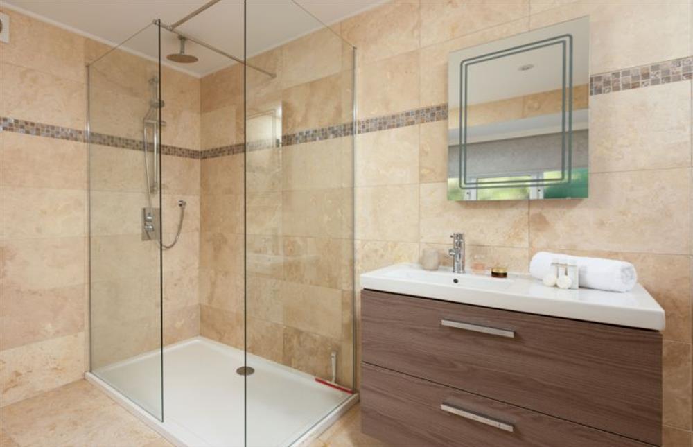 Also features a shower cubicle, wash basin, heated towel rail and WC at Chy an Mor, Coverack