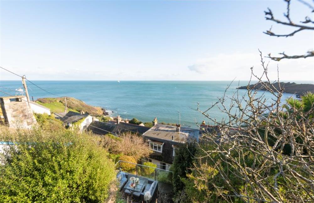 Nestled against the hillside, steps guide you from the parking area down to the property at Chy an Mor, Coverack