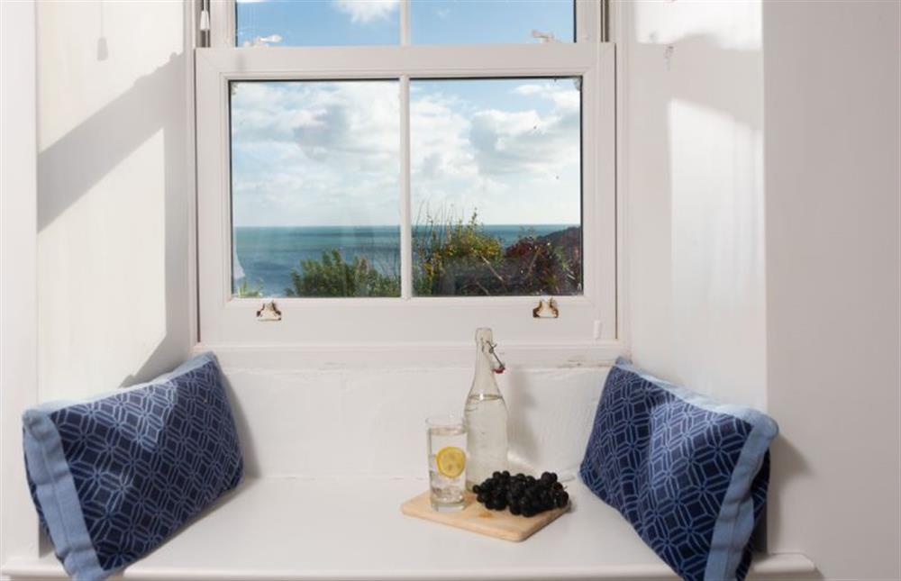 Soak in the views from the window seat in bedroom three at Chy an Mor, Coverack