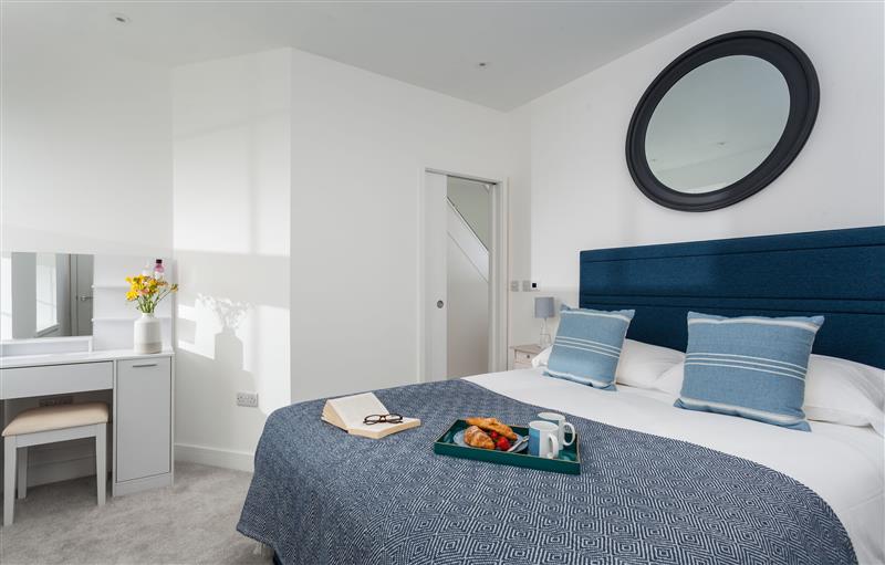 A bedroom in Chy Lowen at Chy Lowen, Porthleven