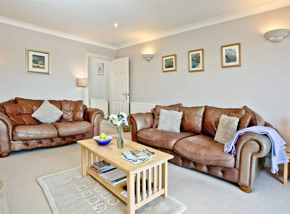 Ample seating in the living room at Chyandour in Fowey, Cornwall