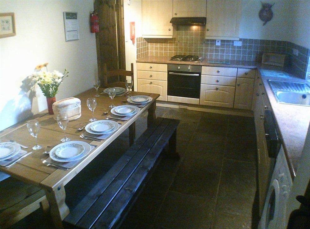 Stylish dining area within well-equipped kitchen at Cider Cottage in Hawkchurch, Nr Lyme Regis., Devon