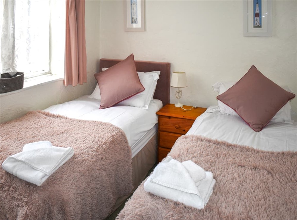 Twin bedroom at Cider Cottage in Sidmouth, Devon