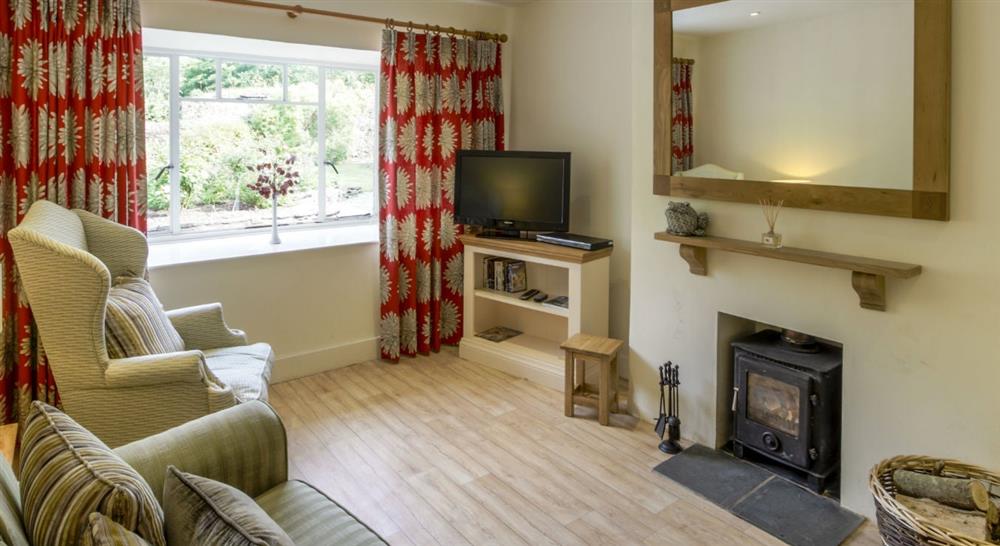 The cosy sitting room at Cider Cottage in Yelverton, Devon