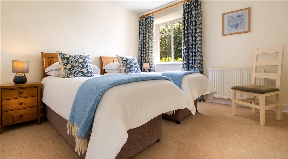 The twin bedroom at Cider Cottage in Yelverton, Devon