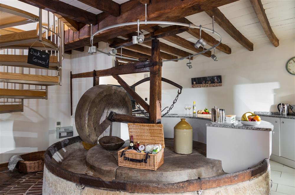 The modern, well-equipped kitchen behind the Apple Press at Cider Mill Cottage, Clifton upon Teme